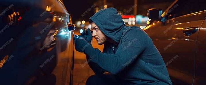 Car thief at night